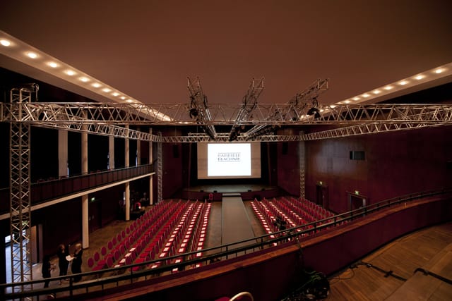 Alte Kongresshalle fashion show runway, tiered seating, event trussing