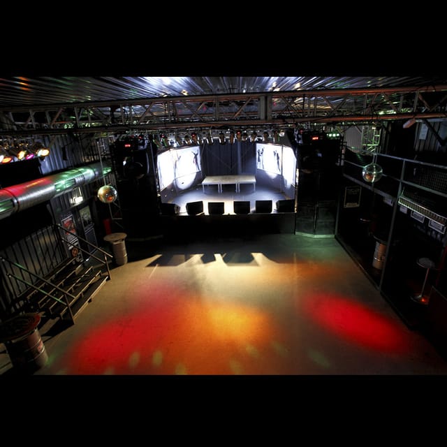 Industrial backstage event venue with customizable staging