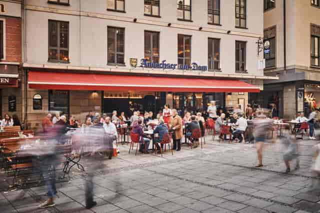 Outdoor networking venue at Andechser am Dom with patio seating for corporate events.