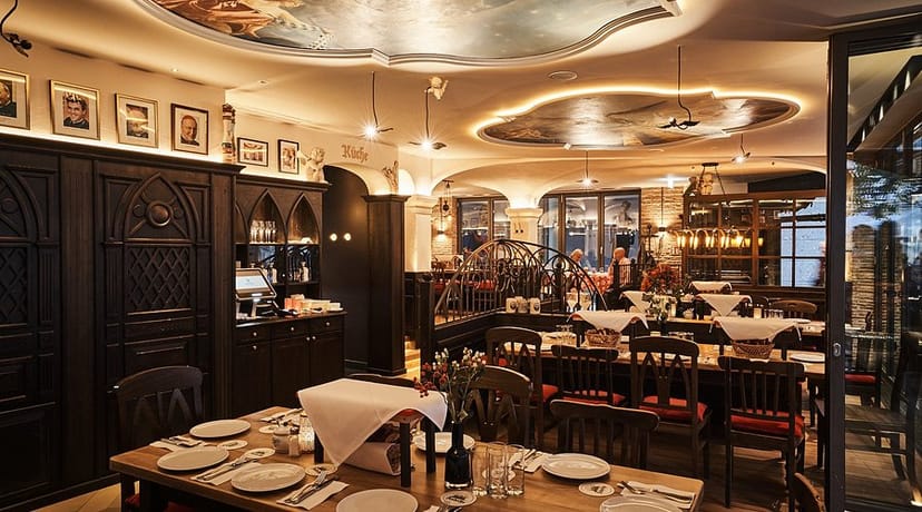 Benediktiner Eck at Andechser am Dom: atmospheric seating for corporate dinners and event venues.