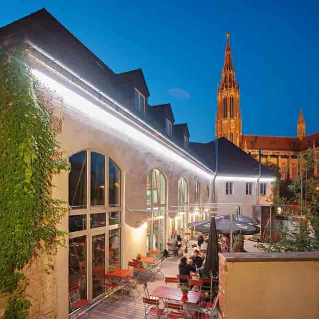 Giesinger Bräu venue with historic architecture for evening receptions and networking mixers.
