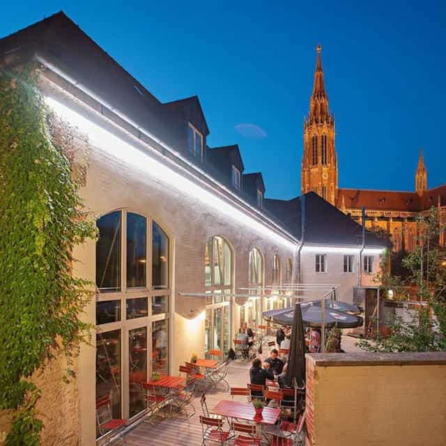 Giesinger Bräu venue with historic architecture for evening receptions and networking mixers.