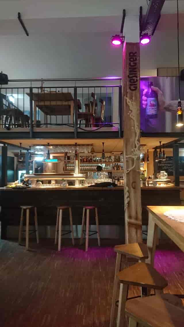 Industrial-chic Giesinger Bräu venue with multi-level layout for networking and receptions.
