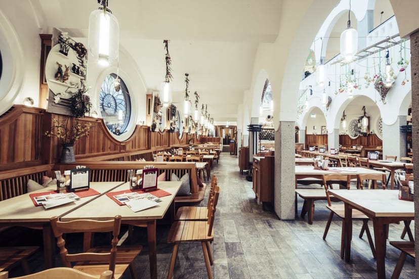 Private dining room at Donisl with versatile bench seating for corporate and networking events.