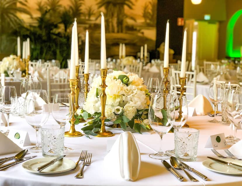 Gala setup at Studio OG, Café Reitschule with gold candelabras for corporate dinners and events.