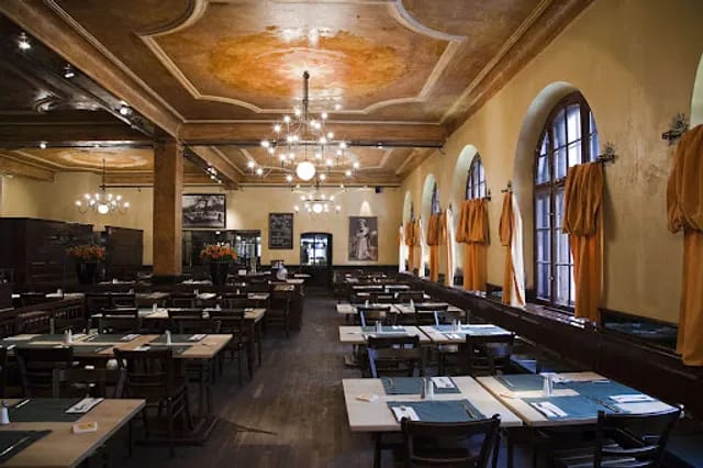 Historic Haxnbauer banquet hall with vaulted ceilings for networking dinners and corporate events.