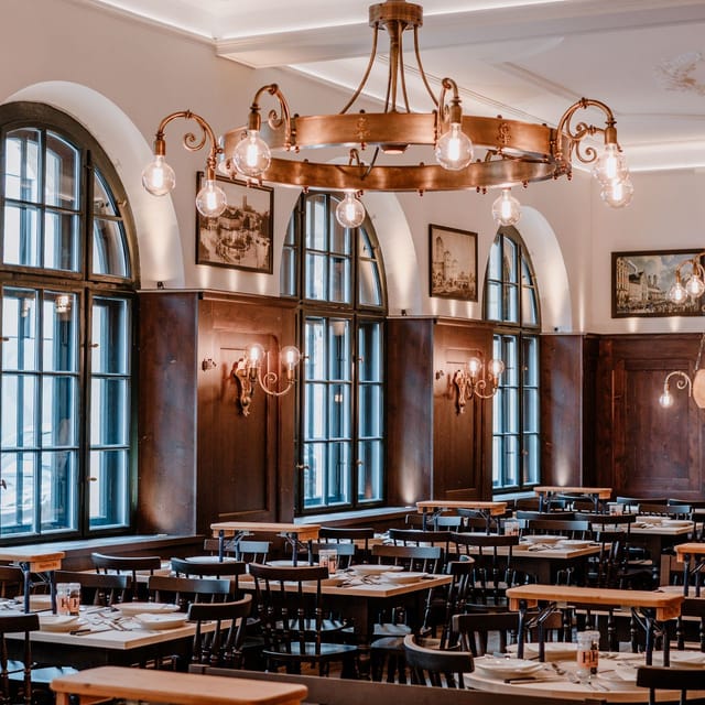 Haxnbauer event venue with wood paneling for corporate dinners and sophisticated networking events.