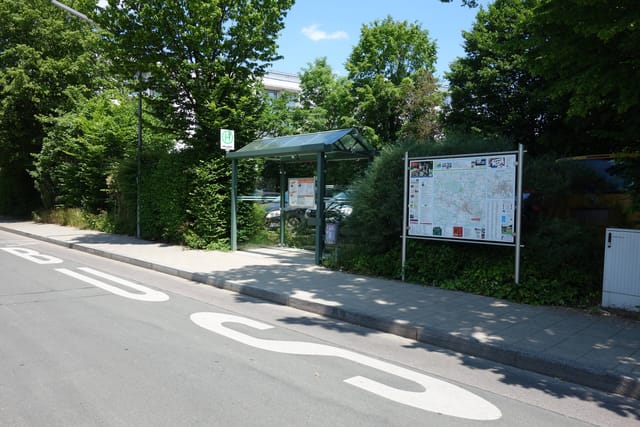 Haus Wendelstein venue entrance with clear wayfinding signage for event logistics and conferences.