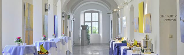 Fürstensaal at Kloster Andechs: bright breakout space with high-tops for events and catering.