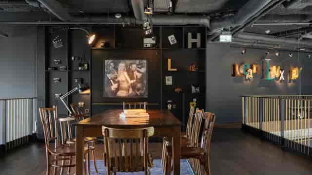 Industrial boutique boardroom for creative brainstorming sessions and corporate meetings.