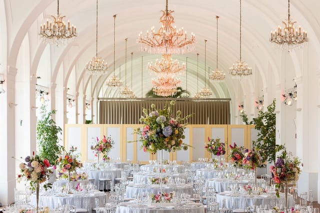Luxury banquet hall with barrel vaulted ceiling for weddings and gala events at Schönbrunn Palace.