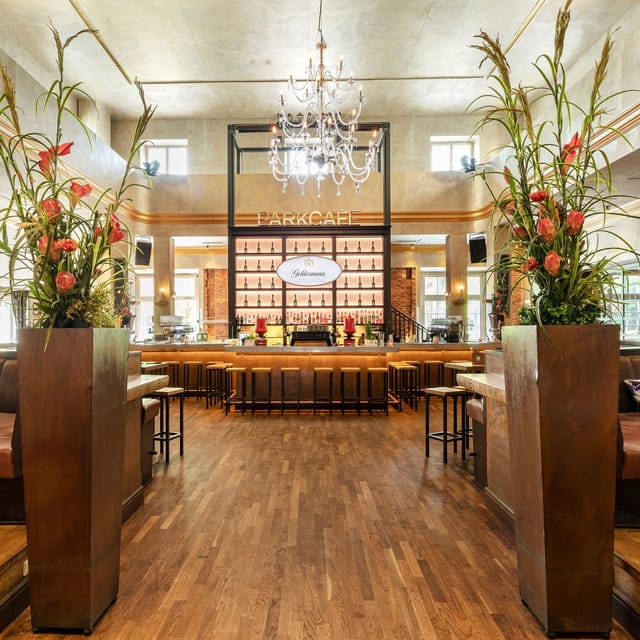 König Ludwig Park Cafe bar with chandeliers for corporate networking and cocktail events.