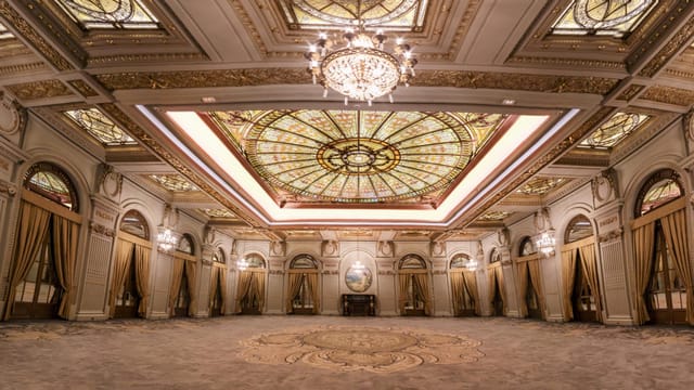 Le Diplomate Ballroom at InterContinental with stained-glass skylight for luxury galas, events.