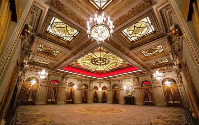 Mozart II ballroom, InterContinental Athénée Palace with opulent lighting for gala events.