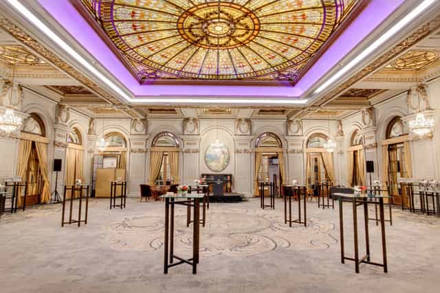 Enescu ballroom with stained-glass dome for elegant cocktail receptions and corporate networking.