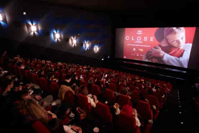 AFI Cotroceni cinema theater with plush seating for corporate plenary sessions and brand events.