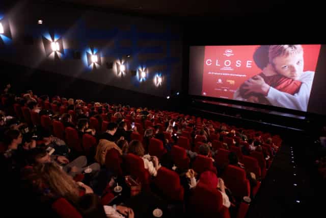 AFI Cotroceni cinema theater with plush seating for corporate plenary sessions and brand events.