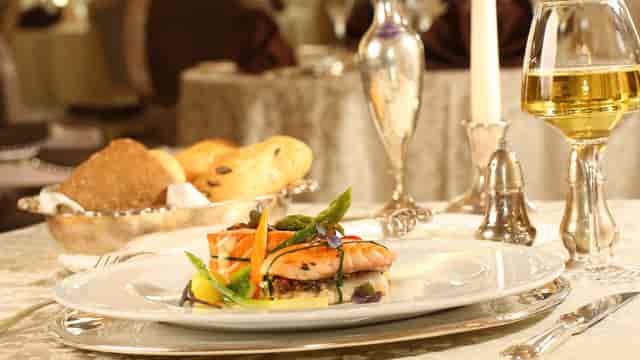 Concerto Fine Dining gala banquet with gourmet salmon, luxury event catering at Grand Hotel.