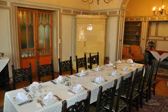 Ornate boardroom in Casa Universitarilor for VIP corporate dinners and private meetings.