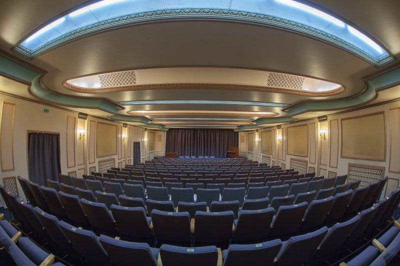 Sala de Spectacole theater, historic tiered seating for keynote presentations and film screenings.