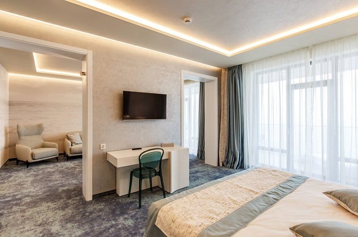 Executive suite at Hotel Opera with workstation for VIP speaker events and business meetings.