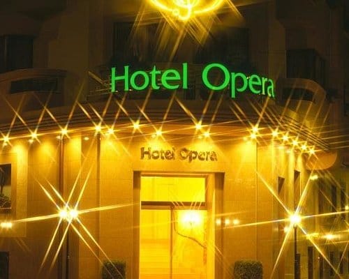 Bright Hotel Opera entrance, elegant suite reception area, event venue.