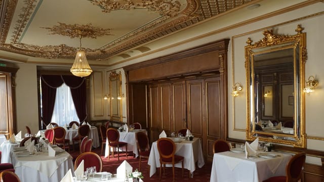Madrigal at Casa Capsa: Elegant function room with ornate ceilings for upscale meetings and events.