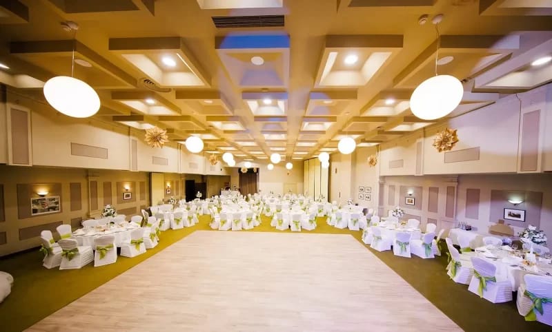 Grand Hotel Traian ballroom with grid ceiling and dance floor for wedding or gala event.