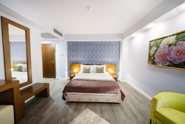 Clean hotel guest room at Phoenicia Hotels for corporate travel and conference accommodation.