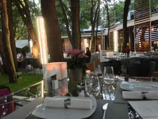 Casa Di David terrace with ambient lighting for sophisticated corporate events and gala dinners.