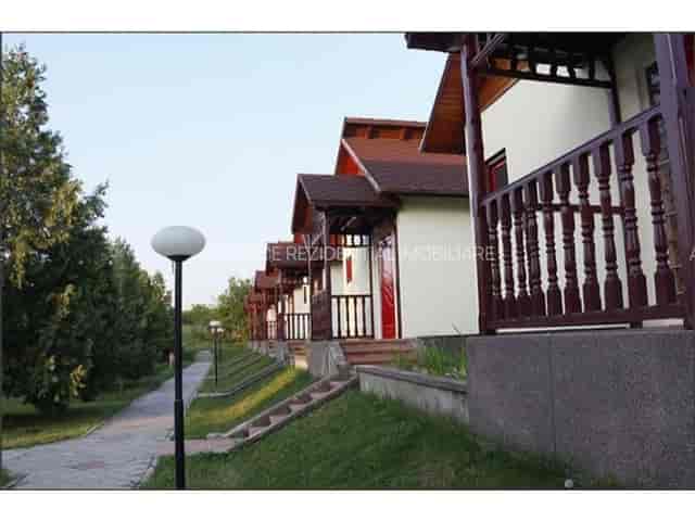 Bungalow-style garden venue at Complex Turistic Miorita for corporate retreats and workshops.
