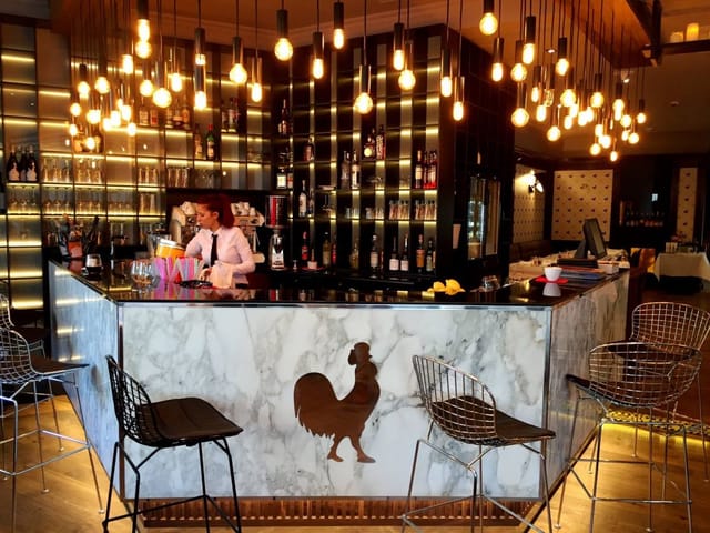 Upscale Gallo Nero hotel bar for VIP networking events and sophisticated evening receptions.