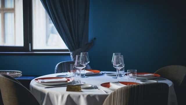 Le Bistrot Français dining room: minimalist table setting for VIP board dinners and events.