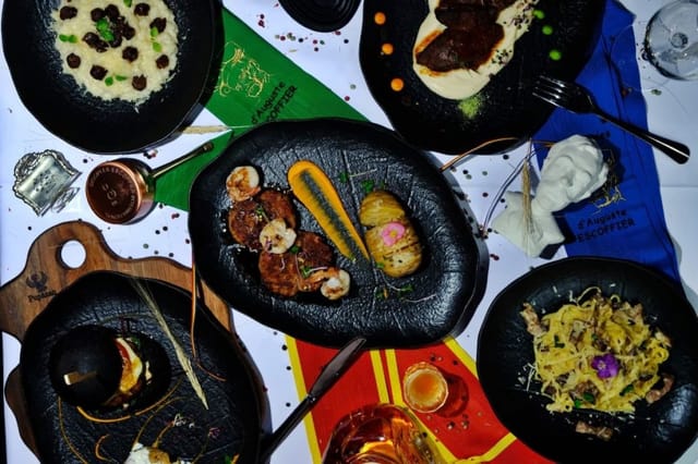 Luxury gala dining experience with elegant black tableware for exclusive VIP events.