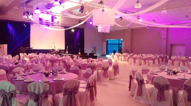 Bucharest gala ballroom with elegant ceiling draping for luxury wedding events.