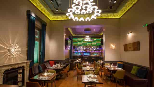 Balthazar Venue first floor with focal bar for corporate dinners and networking mixers.
