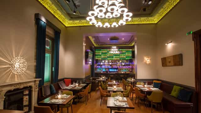 Balthazar Venue first floor with focal bar for corporate dinners and networking mixers.