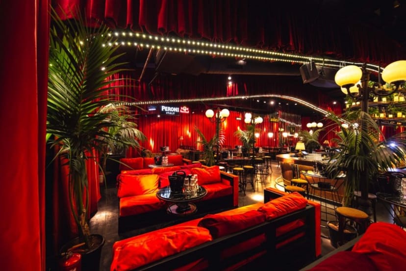 Red velvet lounge at Fratelli Ristorante for exclusive cocktail receptions and brand activations.
