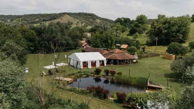 Rustic wedding marquee and pavilion at Valea Verde Retreat outdoor event venue.