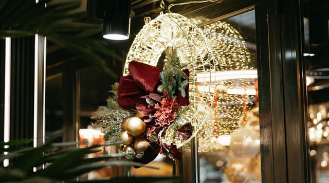 Mamma Mia restaurant entryway with festive holiday decor for corporate festive events.