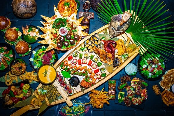 Tiki-themed boat catering display for networking and celebratory corporate events.