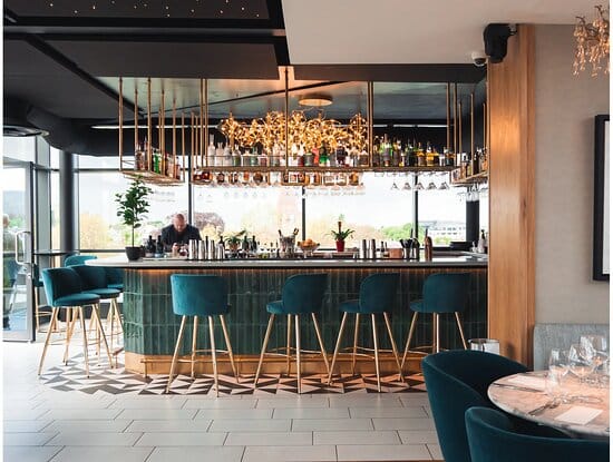 Private dining room with velvet seating for VIP hospitality and corporate event mixers.