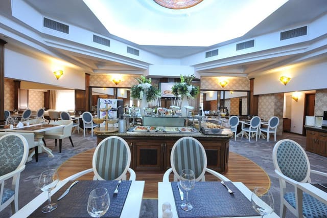 Choral Restaurant banquet space with buffet island for corporate events and networking lunches.