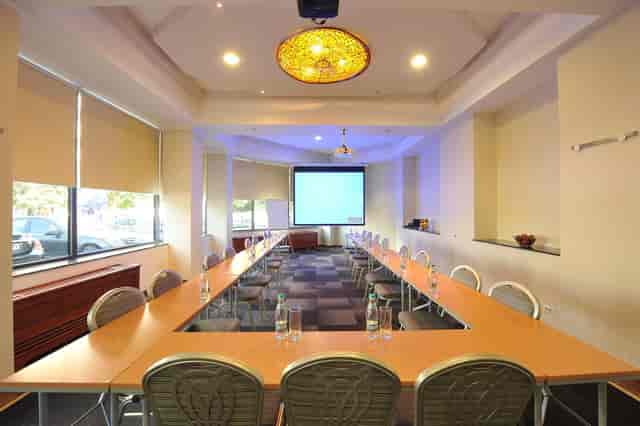 U-shaped boardroom at Choral Restaurant, Crystal Palace Hotel for corporate workshops and meetings.