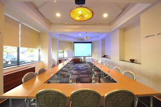 U-shaped boardroom at Choral Restaurant, Crystal Palace Hotel for corporate workshops and meetings.