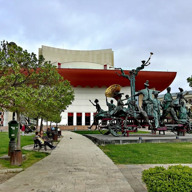 I.L. Caragiale National Theatre outdoor amphitheater, architectural backdrop for event receptions.