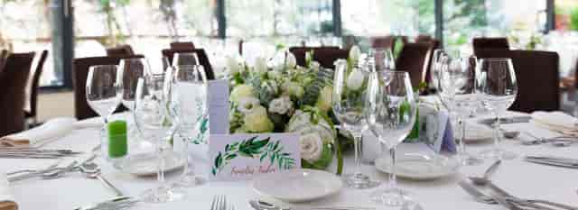 Wedding tablescape at Hotel Epoque with floral centerpieces for elegant wedding reception venues.