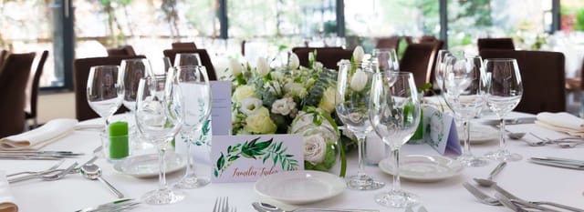Wedding tablescape at Hotel Epoque with floral centerpieces for elegant wedding reception venues.