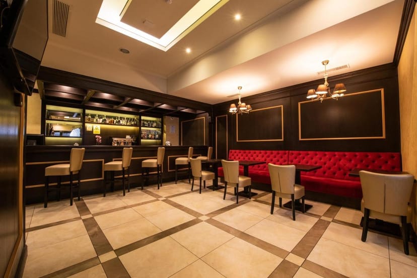 Upscale Hotel Ambasador lounge for VIP receptions and private cocktail events.