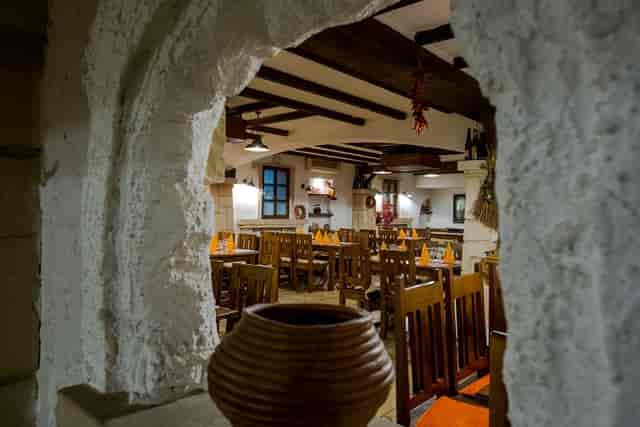 Rustic Crama dining room at Hotel Irisa, ideal for intimate experiential dinners and receptions.